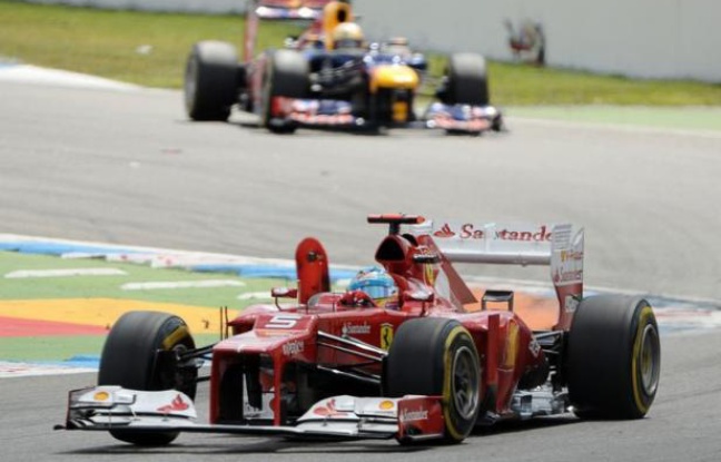 L'Espagnol Fernando Alonso (Ferrari) a remporté dimanche à Hockenheim le Grand Prix d'Allemagne de Formule 1, devant l'Allemand Sebastian Vettel (Red Bull) et le Britannique Jenson Button (McLaren), dépassé par Vettel dans l'avant-dernier tour L'Espagnol Fernando Alonso (Ferrari) a remporté dimanche à Hockenheim le Grand Prix d'Allemagne de Formule 1, devant l'Allemand Sebastian Vettel (Red Bull) et le Britannique Jenson Button (McLaren), dépassé par Vettel dans l'avant-dernier tour