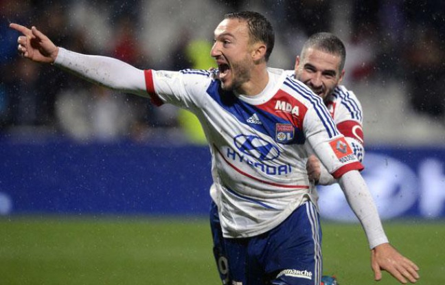 Les Lyonnais Malbranque et Lisandro, le 4 novembre 2012, à Gerland. Les Lyonnais Malbranque et Lisandro, le 4 novembre 2012, à Gerland.