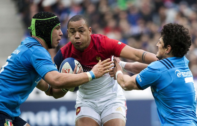 Le centre français Gaël Fickou tente de passer entre les Italiens Francesco Minto (à gauche) et Alessandro Zanni, lors du match d'ouverture du Tournoi des 6 Nations, le 6 février au Stade de France. Le centre français Gaël Fickou tente de passer entre les Italiens Francesco Minto (à gauche) et Alessandro Zanni, lors du match d'ouverture du Tournoi des 6 Nations, le 6 février au Stade de France.