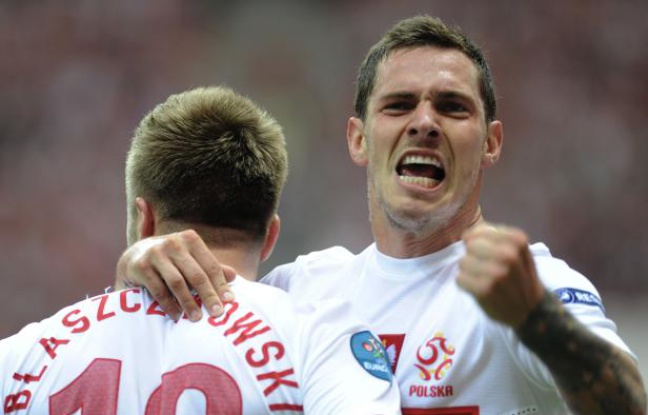 Les joueurs polonais Blaszczykowski et Obraniak (à dr.) lors du match de l'Euro contre la Grèce, le 8 juin 2012. Les joueurs polonais Blaszczykowski et Obraniak (à dr.) lors du match de l'Euro contre la Grèce, le 8 juin 2012.