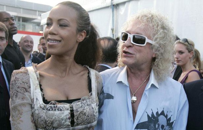 Le chanteur Michel Polnareff et sa compagne Danyellah, à Paris, le 14 juillet 2007. Le chanteur Michel Polnareff et sa compagne Danyellah, à Paris, le 14 juillet 2007.