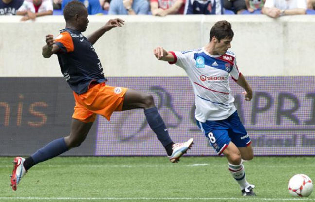 Yoann Gourcuff (à doite) et Henri Bedimo lors du match OL-Montpellier du Trophée des champions, le 28 juillet 2012. Yoann Gourcuff (à doite) et Henri Bedimo lors du match OL-Montpellier du Trophée des champions, le 28 juillet 2012.