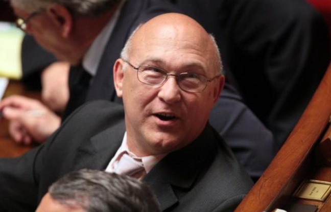 Michel Sapin, proche de François Hollande, a jugé vendredi que le projet socialiste a "dit un certain nombre de choses" mais que le programme du candidat François Hollande l'"inscrit dans le temps" et "la réalité". Michel Sapin, proche de François Hollande, a jugé vendredi que le projet socialiste a "dit un certain nombre de choses" mais que le programme du candidat François Hollande l'"inscrit dans le temps" et "la réalité".