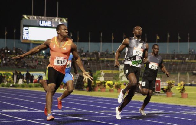 Les sprinters jamaïcains Yohan Blake (à g.) et Usain Bolt (à dr.) lors des sélections jamaïcaines sur 100m, le 29 juin 2012. Les sprinters jamaïcains Yohan Blake (à g.) et Usain Bolt (à dr.) lors des sélections jamaïcaines sur 100m, le 29 juin 2012.