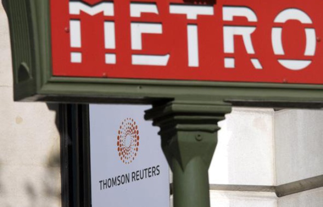 A plaque featuring the new logo for Thomson Reuters company is seen behind a Paris Metro sign on the facade of their Paris offices on Boulevard Haussmann April 17, 2008. Thomson Reuters Corp debuted on Thursday as a leading global information company, hoping a portfolio of products from financial to legal and health-care will help it ride out a financial industry downturn. REUTERS/Mal Langsdon (FRANCE) A plaque featuring the new logo for Thomson Reuters company is seen behind a Paris Metro sign on the facade of their Paris offices on Boulevard Haussmann April 17, 2008. Thomson Reuters Corp debuted on Thursday as a leading global information company, hoping a portfolio of products from financial to legal and health-care will help it ride out a financial industry downturn. REUTERS/Mal Langsdon (FRANCE)