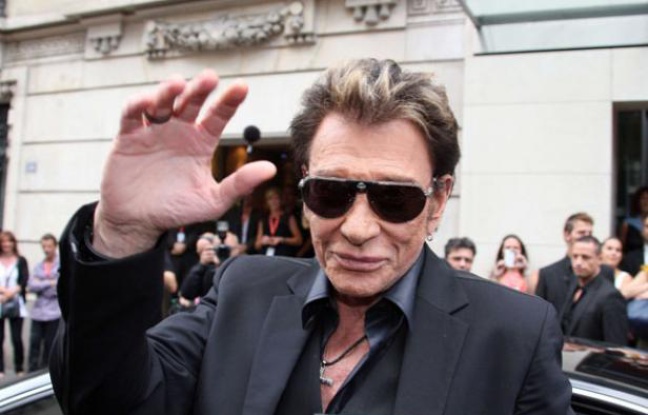 Johnny Hallyday arrive à la station de radio RTL à Paris, le 30 mai 2011 Johnny Hallyday arrive à la station de radio RTL à Paris, le 30 mai 2011