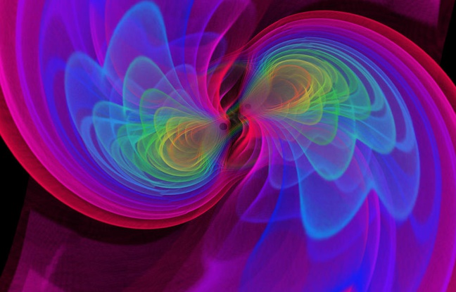 Vue d’artiste de deux trous noirs qui, en fusionnant, émettent des ondes gravitationnelles. Vue d’artiste de deux trous noirs qui, en fusionnant, émettent des ondes gravitationnelles.