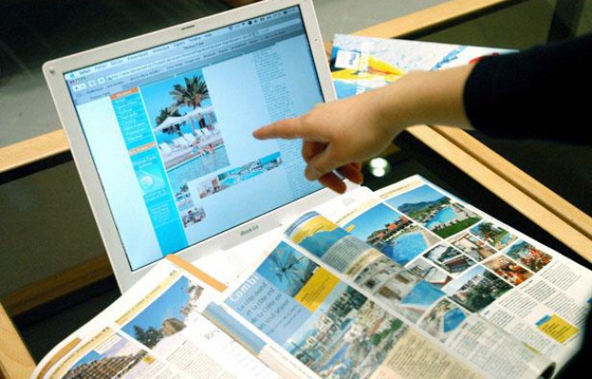 Une réservation en ligne d'un voyage Une réservation en ligne d'un voyage