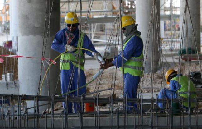 Des ouvriers sur un chantier à Doha au Qatar, le 3 octobre 2013 Des ouvriers sur un chantier à Doha au Qatar, le 3 octobre 2013