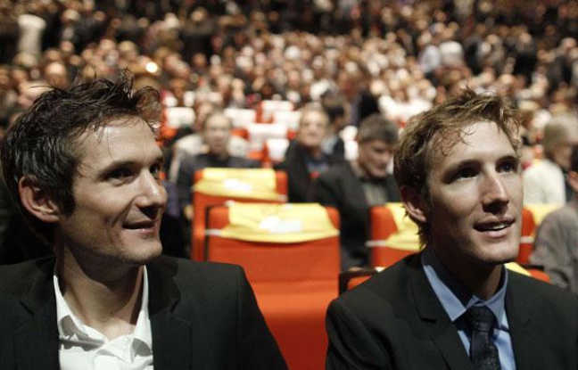 Franck et Andy Schleck, le 18 octobre 2011, au Palais des Congrès de Paris. Franck et Andy Schleck, le 18 octobre 2011, au Palais des Congrès de Paris.