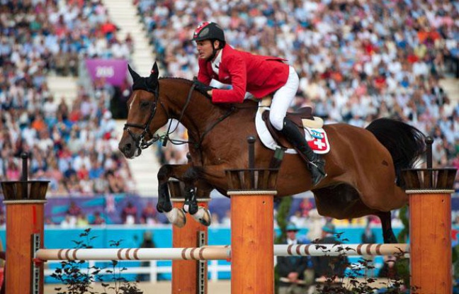 Le Suisse Steve Guerdat lors de la finale du jumping aux JO de Londres, le 08 août 2012. Le Suisse Steve Guerdat lors de la finale du jumping aux JO de Londres, le 08 août 2012.