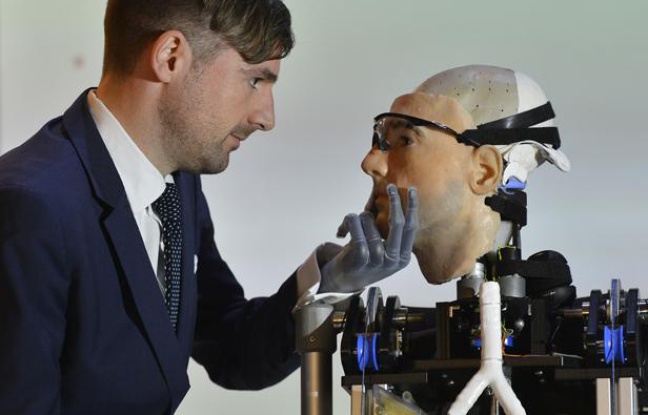 Swiss social psychologist Bertolt Mayer views 'Rex', a two metre tall artificial human, at the Science Museum in central London February 5, 2013. Mayer, a who uses a prosthetic hand himself, was used as the model for the 'bionic man', whom the British roboticist designers claim is the world's first complete bionic man, featuring artificial organs as well as fully functioning limbs. It will be on public display until March 11. Swiss social psychologist Bertolt Mayer views 'Rex', a two metre tall artificial human, at the Science Museum in central London February 5, 2013. Mayer, a who uses a prosthetic hand himself, was used as the model for the 'bionic man', whom the British roboticist designers claim is the world's first complete bionic man, featuring artificial organs as well as fully functioning limbs. It will be on public display until March 11.