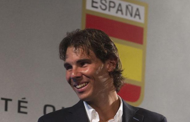 Le tennisman Rafael Nadal, lors de sa remise de drapeau, le 14 juillet 2012 à Madrid. Le tennisman Rafael Nadal, lors de sa remise de drapeau, le 14 juillet 2012 à Madrid.