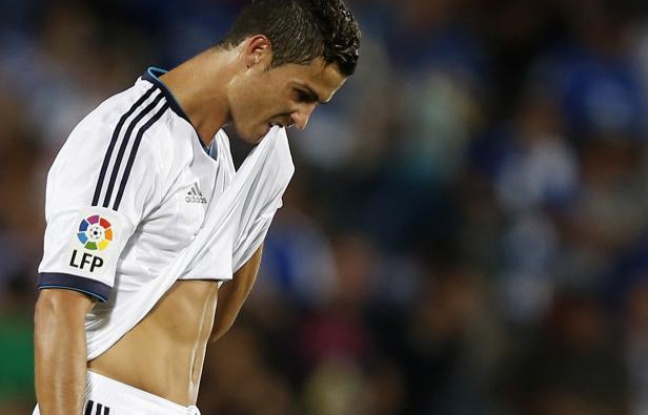 L'attaquant du Real Madrid Cristiano Ronaldo, le 26 août 2012 lors d'un match contre Getafe en championnat. L'attaquant du Real Madrid Cristiano Ronaldo, le 26 août 2012 lors d'un match contre Getafe en championnat.