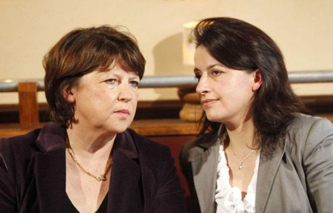 Martine Aubry (PS) et Cécile Duflot (EELV) lors d'une conférence de presse à Paris, le 18 mars 2010. Martine Aubry (PS) et Cécile Duflot (EELV) lors d'une conférence de presse à Paris, le 18 mars 2010.