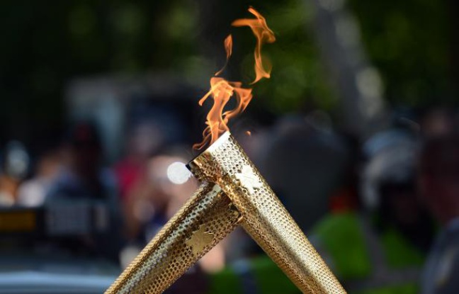 La flamme olympique, le 26 juillet 2012 à Londres. La flamme olympique, le 26 juillet 2012 à Londres.