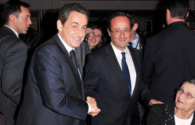 Nicolas Sarkozy et François Hollande se saluent pendant le dîner du Crif, mercredi 8 février 2012 au Pavillon d'Armenonville, à Paris. Nicolas Sarkozy et François Hollande se saluent pendant le dîner du Crif, mercredi 8 février 2012 au Pavillon d'Armenonville, à Paris.
