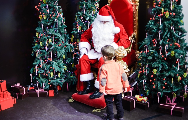 648x415_enfant-devant-pere-noel-magasin-paris-23-decembre-2009.jpg