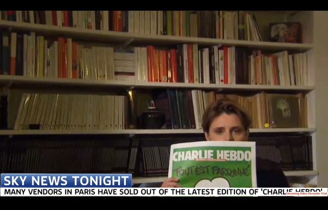 Caroline Fourest essaye de montrer la une de Charlie Hebdo à la tél britannique Caroline Fourest essaye de montrer la une de Charlie Hebdo à la tél britannique