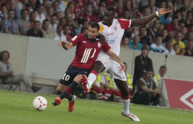 Marvin Martin (à gauche), face à l'AS Nancy-Lorraine, le 17 août 2012, au Grand Stade de Lille. Marvin Martin (à gauche), face à l'AS Nancy-Lorraine, le 17 août 2012, au Grand Stade de Lille.