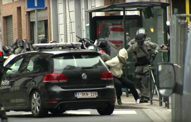 Un suspect interpellé par la police belge. Un suspect interpellé par la police belge.