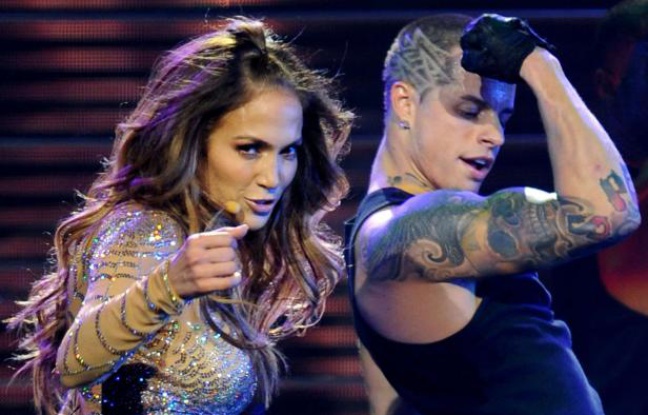 Jennifer Lopez et Casper Smart sur scène à New York le 22 octobre 2011. Jennifer Lopez et Casper Smart sur scène à New York le 22 octobre 2011.