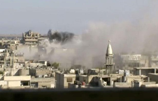 Image tirée d'une vidéo d'amateur, montrant des explosions dans la région de Homs, le 8 juin 2012 Image tirée d'une vidéo d'amateur, montrant des explosions dans la région de Homs, le 8 juin 2012