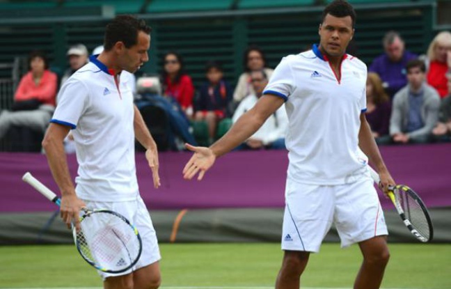Jo-Wilfried Tsonga et Michael Llodra, le 2 août 2012 à Londres. Jo-Wilfried Tsonga et Michael Llodra, le 2 août 2012 à Londres.