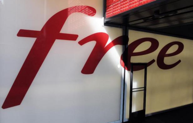 Le logo de Free au siège du groupe Iliad à Paris, le 10 mars 2014 Le logo de Free au siège du groupe Iliad à Paris, le 10 mars 2014
