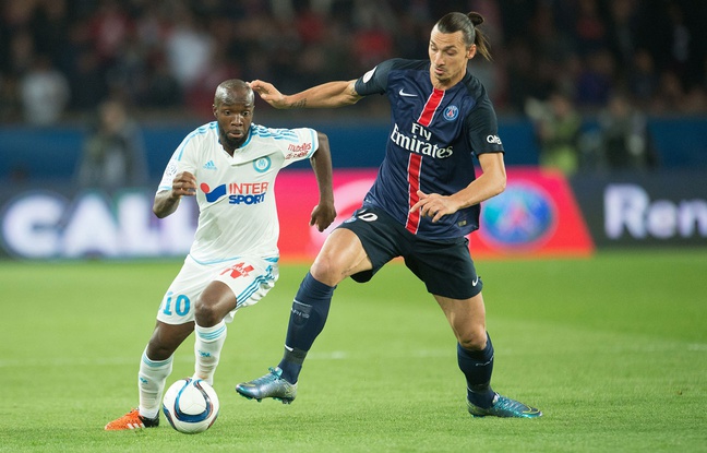 Zlatan Ibrahimovic au duel avec Lassana Diarra lors de PSG-OM le 4 octobre 2015. Zlatan Ibrahimovic au duel avec Lassana Diarra lors de PSG-OM le 4 octobre 2015.