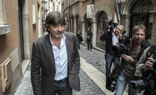 L'ancien policier chef de l'antigang à Lyon, Michel Neyret dans une des rues de la ville, le 19 septembre 2014 après avoir été entendu au tribunal