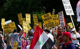 Des manifestants hostiles à une possible attaque américaine contre la Syrie, le 31 août 2013 devant la Maison Blanche à Washington