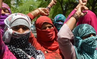 Des Indiennes manifestent contre les violences faites aux femmes à New Delhi, le 22 avril 2014.
