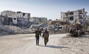 Des combattants kurdes à Kobané le 19 novembre 2014.
