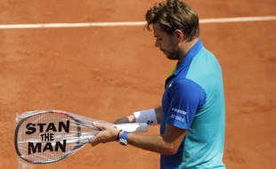 Switzerland's Stan Wawrinka changes his racket as he plays Ukraine's Alexandr Dolgopolov during their second round match of the French Open tennis tournament at the Roland Garros stadium, Thursday, June 1, 2017 in Paris.
