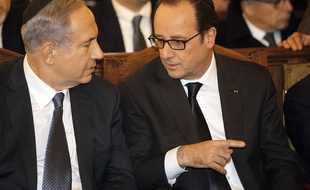 Benjamin Netanyahu et François Hollande lors d'une cérémonie à la Grande synagogue de la Victoire, à Paris, le 11 janvier 2015.