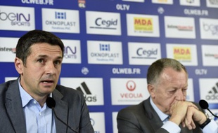 Rémi Garde et Jean-Michel Aulas en conférence de presse, le 13 mai 2014.