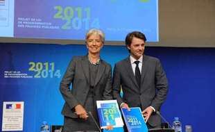 La ministre de l'Economie, Christine Lagarde, et le ministre du Budget, François Baroin, lors d'une conférence de presse à Paris en septembre 2010.