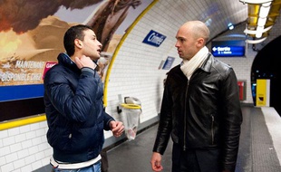 Mohamed, mise en cause dans l'affaire du meurtre de Babu au metro Crimee et son avocat, maitre d'Ollone Augustin, retournent sur le quai de la station pour faire une reconstitution, le 16 novembre 2011.