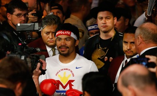Le boxeur Manny Pacquiao accompagné par l'animateur américain Jimmy Kimmel, le 2 mai 2015, à Las Vegas.