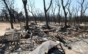 L'incendie qui a fait quatre morts et dévasté 14.000 hectares de végétation dans le nord-est de l'Espagne depuis dimanche était mardi soir "en phase de contrôle", a annoncé le ministre de l'Intérieur du gouvernement catalan, Felip Puig.