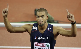 France's Benjamin Compaore celebrates winning the gold in the men's triple jump final during the European Athletics Championships in Zurich, Switzerland, Thursday, Aug. 14, 2014. (AP Photo/Matt Dunham)/FOS204/61454520628/1408142228