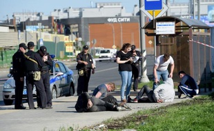 La police interroge des suspects suite à une énorme rixe dans un cimetière de Moscou qui a fait au moins trois morts, le 14 mai 2016