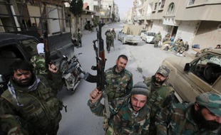Soldats des forces gouvernementales syriennes le 16 mars 2014 à Yabroud