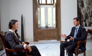 Le président Bachar al-Assad lors d'une interveiw avec la chaîne chinoise de télévision Phoenix, le 22 novembre 2015 à Damas