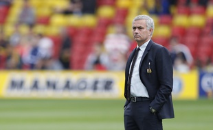 La photo prise au bon moment, avec la bannière Football Manager en fond...