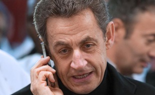 Nicolas Sarkozy au téléphone, en 2012.