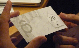 Illustration d'une version non définitive de la monnaie locale de Montreuil, la pêche.