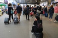 Des voyageurs attendent à la gare Montparnasse à Paris, le 30 juillet 2017, en raison d'une panne.