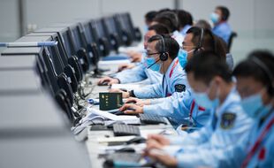 Le centre de contrôle de Pékin lors de l'atterrissage de la mission Chang'E 5 sur la lune, le 1er décembre 2020.
